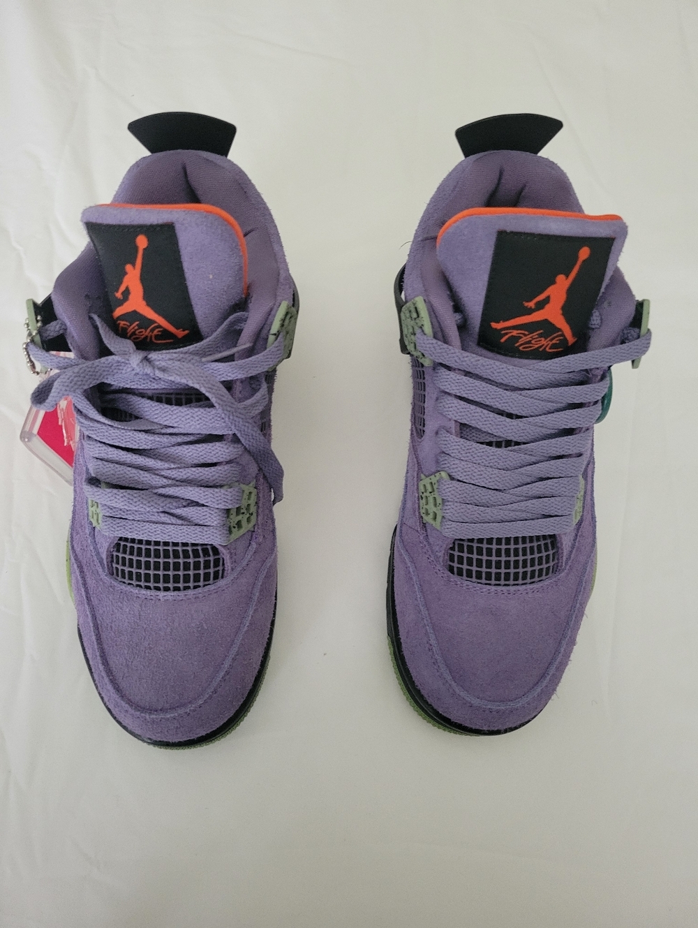 Jordan Purple Suede Sneakers with Orange Logo and Green Accents